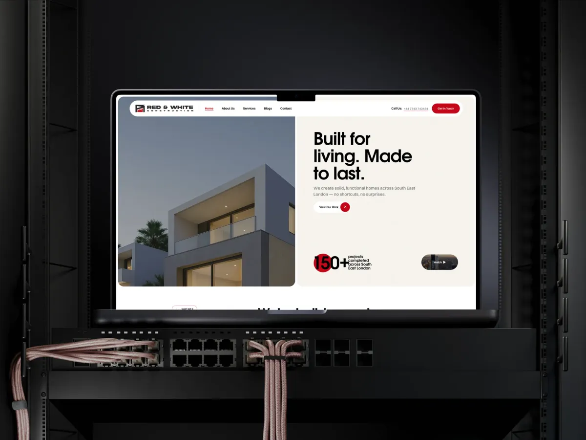Red & White Construction website showing project showcases and customer testimonials